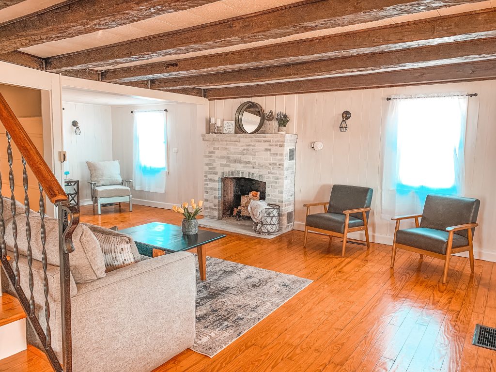 Living room white washed fireplace