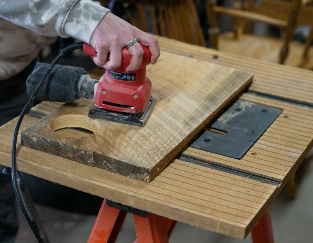 sanding the diy charcuterie board